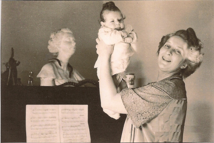 1954 Three weeks old with my mother )